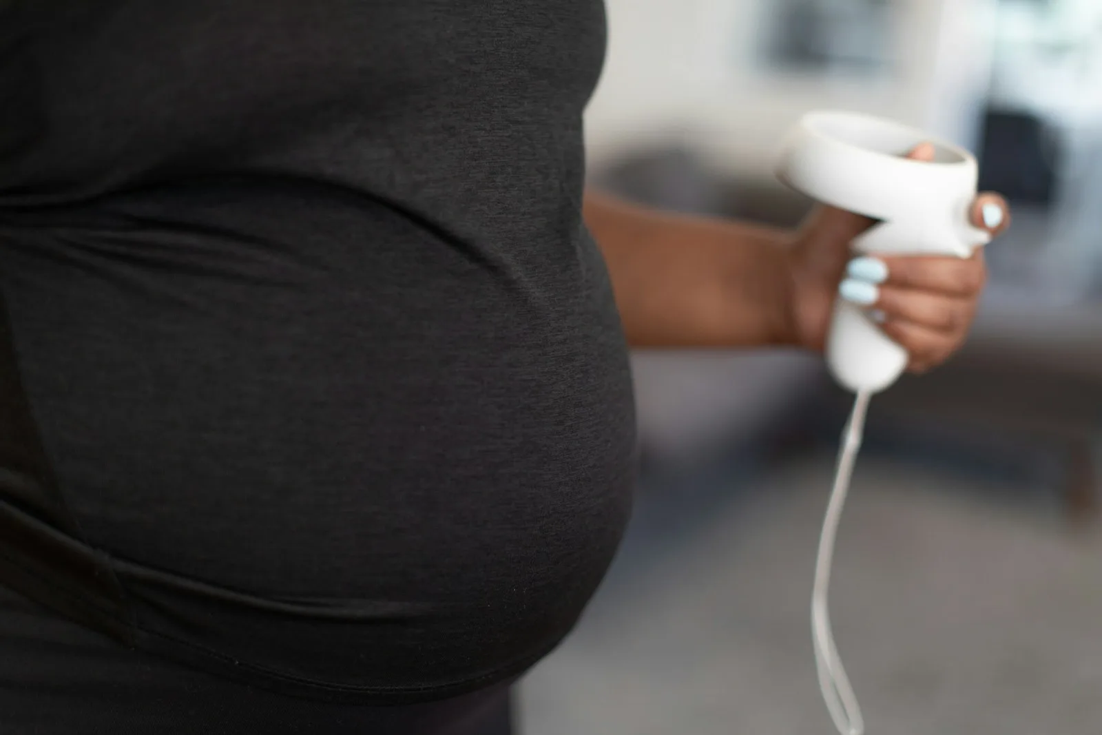 a person holding a video game controller